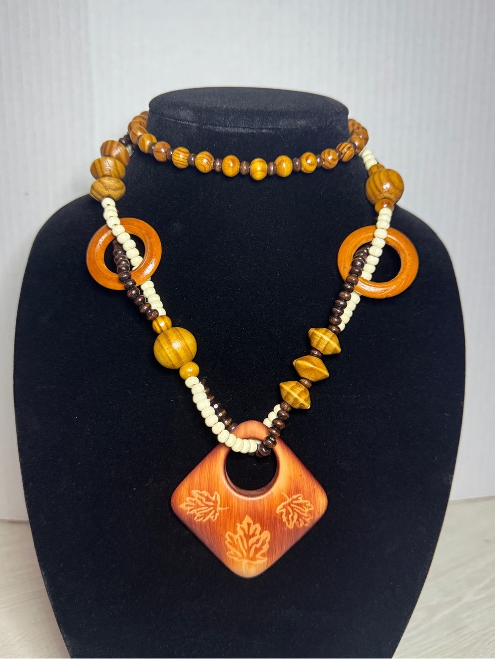 Boho Carved Wooden Pendant Necklace in Orange and Cream